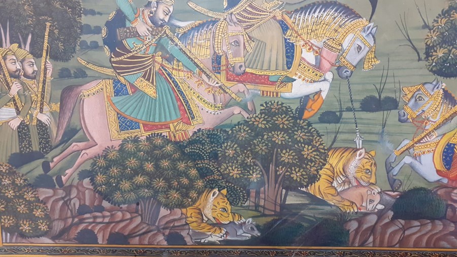 An INDIAN Mewar school miniature painting depicting a Maharajah and courtieurs hunting tigers, (29. - Image 3 of 3