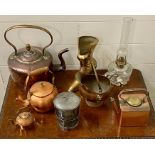 A Selection of copper and brass items.