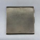 A Hallmarked silver compact case AW makers mark, dated Birmingham 1941