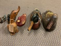 Six wooden carved ducks