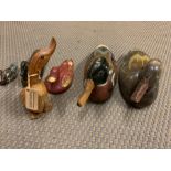 Six wooden carved ducks