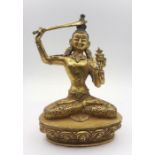 A Tibetan gilt bronze of Manjushri brandishing sword of wisdom, (19 cm high). Provenance: From the