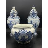 A Delft Garniture set (AF) comprising a bowl and two lidded vase