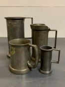 Four pewter tankards