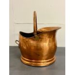 A copper coal bucket