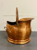 A copper coal bucket