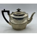 A Hallmarked silver teapot (448g) engraved and dated Sheffield 1895, makers mark James Deakin and