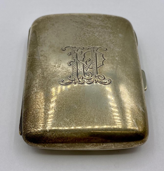 A silver monogrammed cigar case by Minshull & Latimer, hallmarked Birmingham 1898