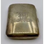 A silver monogrammed cigar case by Minshull & Latimer, hallmarked Birmingham 1898