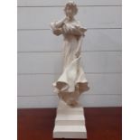 A 20th century Continental sculpture of a young girl in the Art Nouveau style, unsigned,