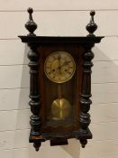 A mahogany in case wall clock