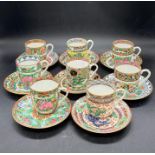 A selection of eight Famille Rose tea cups and saucers