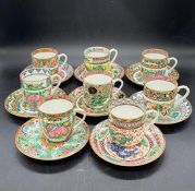 A selection of eight Famille Rose tea cups and saucers