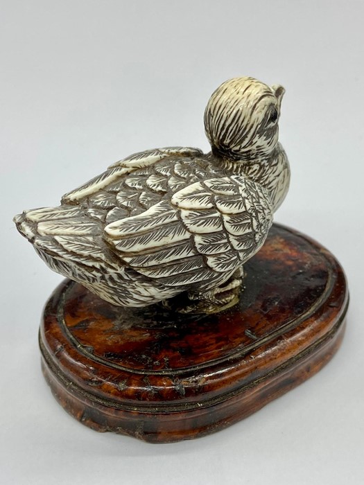 An Antique ivory bird on a wooden base. - Image 3 of 4