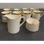 Eight "Golden Glory" fine bone Crown china coffee cans, milk jug and sugar bowl