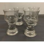 Four large goblet style glasses on steams