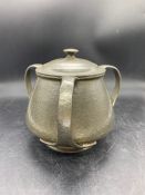 A, Tudric design pewter three handle lidded pot (01064)