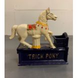 A novelty cast iron mechanical circus pony money box (Missing stopper)