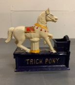 A novelty cast iron mechanical circus pony money box (Missing stopper)