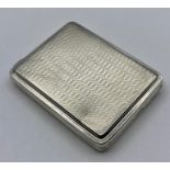 A Machine tooled silver card case Adie Brothers Ltd, hallmarked Birmingham 1928.