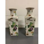 A pair of vases decorated with flowers and inserts (H35cm)