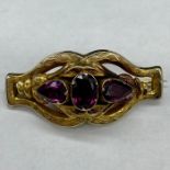 An untested three stone brooch.