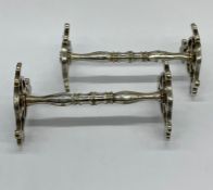 A Pair of hallmarked silver knife rests