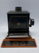 A Magic Lantern and assorted slides.