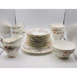A part Royal Standard tea service to include, six cups, eight saucers, eight side plates, cake