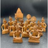 Twelve carved wood figures