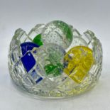 A selection of six glass bubble balls in various colours.