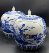 A Pair of Blue and White Chinese lidded vases / ginger jars.