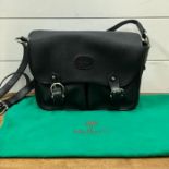 A vintage Mulberry satchel/handbag in black with two pockets to front, in clean used condition and