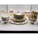 A part Royal Strafford tea service "Clematis" to include, Five cups and six saucers, five side