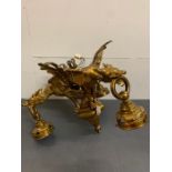 A gilt bronze Victorian Chandelier with three open winged griffins holding the ring light fitting (