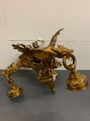 A gilt bronze Victorian Chandelier with three open winged griffins holding the ring light fitting (