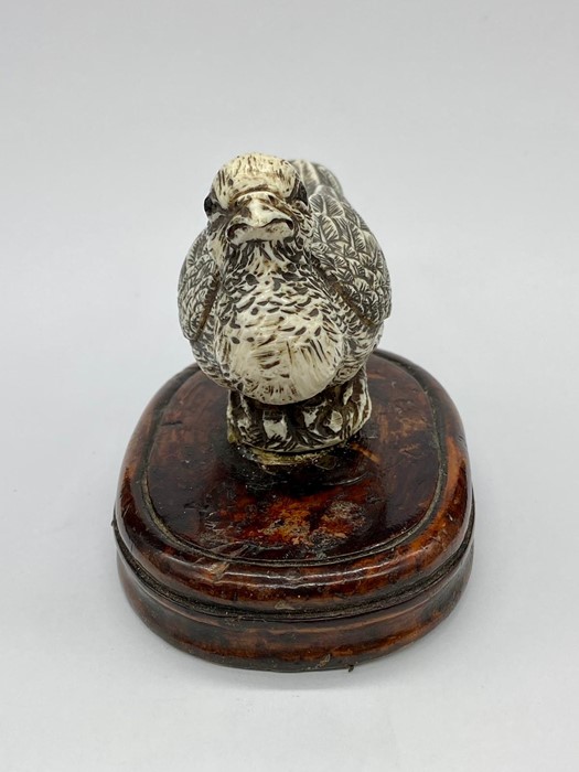 An Antique ivory bird on a wooden base. - Image 2 of 4