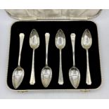 A Boxed set of six grapefruit silver spoons, hallmarked for Sheffield 1937, by Cooper Brothers &