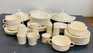 A part set of Royal Worcester Crown Ware dinner service with a fruit decoration around the edge of