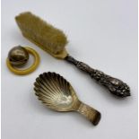 A selection of hallmarked silver curios to include baby spoon and rattle
