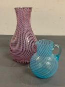 Two pieces of striped glass, one vase and one jug