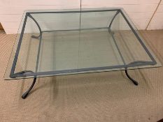 A square glass top coffee table on metal base and shelf under (114 cm x 145 cm x 43 cm)