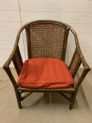 A cane and bamboo style chair