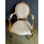 A French style gilt chair with cream upholstery