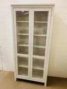 A glazed bookcase (H198cm W89cm D37cm)