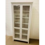 A glazed bookcase (H198cm W89cm D37cm)