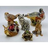 A selection of small decorative aminals with storage department