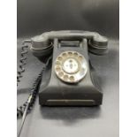 A Vintage Black Bakelite Telephone