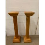 A pair of wooden pillars