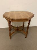 An octagonal centre table (H70cm W30cm D30cm) AF